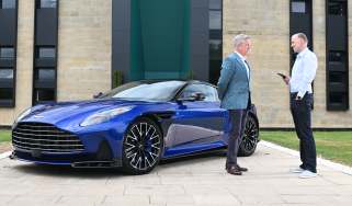 Aston CEO Adrian Hallmark talking to Phil McNamara next to a Vanquish