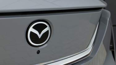 Mazda CX-6e - Mazda badge