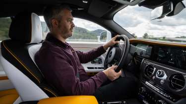 Richard Ingram driving the Rolls-Royce Spectre Black Badge