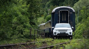 Land Rover Discovery Sport train pull on track