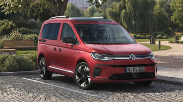 Volkswagen Caddy van - rear front 3/4