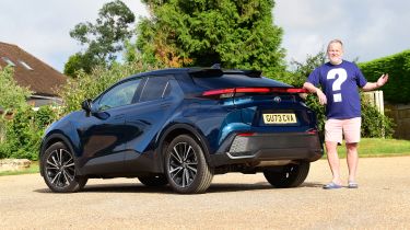 Auto Express commercial editor Paul Adam standing behind the Toyota C-HR