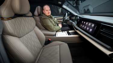 Ellis Hyde sat in the Audi Q9