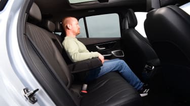 Auto Express chief reviewer Alex Ingram sitting in the Mercedes EQE SUV&#039;s back seat