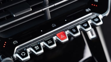 Peugeot E-208 dashboard toggle switches