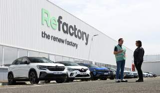 Auto Express consumer reporter Tom Jervis standing outside the Renault ReFactory facility