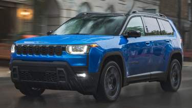 New Jeep Cherokee - blue dynamic front 3/4 in the wet