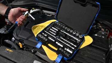Auto Express products editor Tom Barnard holding a Draper ratchet