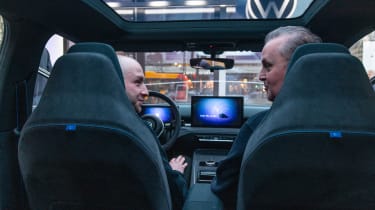 Auto Express editor-in-chief Steve Fowler sitting inside the VW ID.2All concept with Volkswagen head of design Andreas Mindt