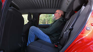 Auto Express senior test editor Dean Gibson sitting in the Nissan Micra's rear seat
