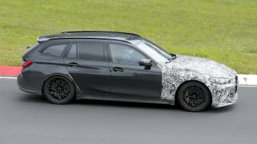 BMW M3 CS Touring (camouflaged) - side action