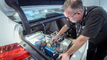 Horiba Mira technician setting up electrical equipment