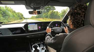 Auto Express senior staff writer Jordan Katsianis driving Audi A6 e-Hybrid