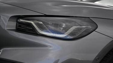 New BMW M2 being driven in the UK - front headlight 