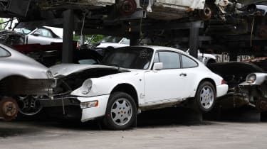 Crash damaged Porsche white