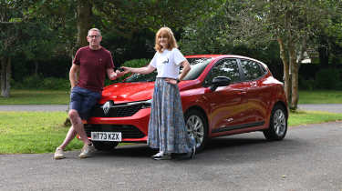 Auto Express pictures editor Dawn Grant and her husband Dave standing next to the Renault Clio