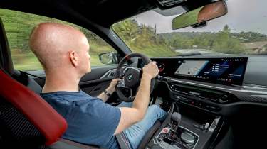 Auto Express chief reviewer Alex Ingram driving the BMW M4 CS