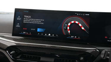 New BMW M2 being driven in the UK - infotainment screen 