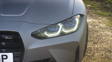 Audi RS 4 Avant vs BMW M3 Touring - BMW front headlight 