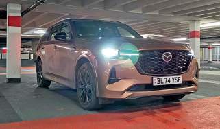 Mazda CX-80 Homura Plus - front 3/4 in a carpark