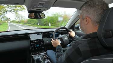 Auto Express deputy editor Richard Ingram driving the Citroen e-C5 Aircross
