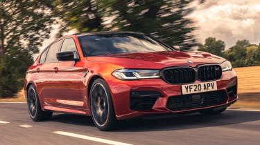 https://media.autoexpress.co.uk/image/private/s--TTNzmH2J--/f_auto,t_content-image-full-mobile@1/v1664268238/autoexpress/2022/09/BMW-M5-2022-%2818%29_c1tshk.jpg