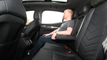 Auto Express chief reviewer Alex Ingram sitting in the back seat of the Maserati Grecale