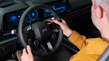 Richard Ingram sitting in the Hyundai Ioniq 6 N