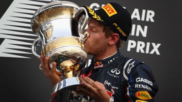 Sebastian Vettel celebrates on the podium