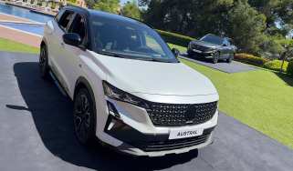 Renault Austral - White front overhead with grey in the background