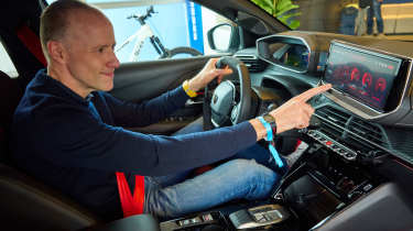 Peugeot E-208 GTi - Phil McNamara in car