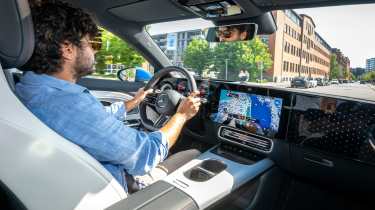 Jordan Katsianis driving the Mercedes CLA with EQ Technology