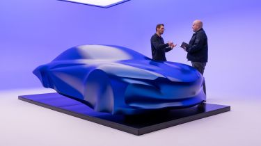 Alpine A110 EV sculpture - Auto Express news reporter Ellis Hyde speaking to Antony Villain, designer, front 
