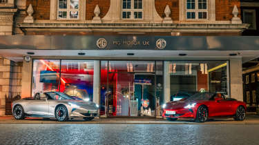 New MG Cyberster - silver and red cars outside MG London