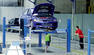 Mitsubishi Lancer Evo IX in workshop