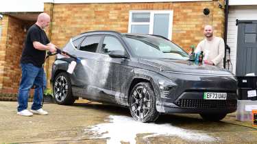 Auto Express creative director Darren Wilson washing the Hyundai Kona Electric