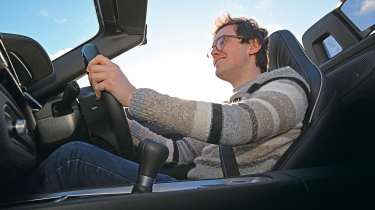 Auto Express consumer reporter Tom Jervis driving a BMW Z4