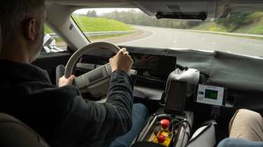 Richard Ingram driving the Jaguar GT