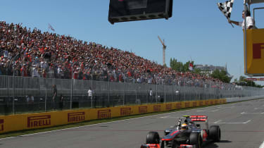 Lewis Hamilton crosses the finish line
