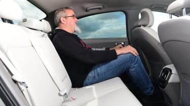 Hyundai Ioniq 6 - rear seats with Auto Express senior test editor, Dean Gibson