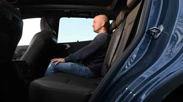 BMW X3 - rear seats with Auto Express Chief reviewer, Alex Ingram