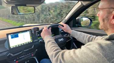 Auto Express creative director Darren Wilson driving the Dacia Bigster