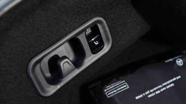 Mercedes E-Class E 300 e - rear seat folding control detail