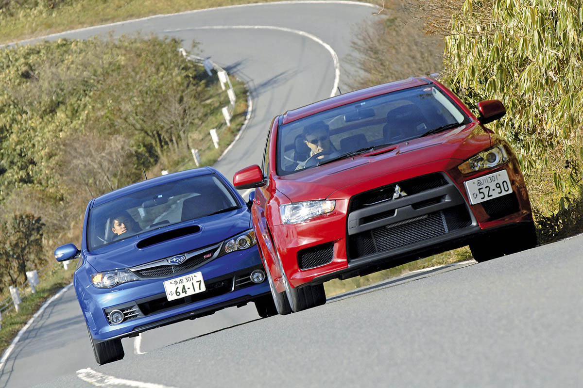 Mitsubishi Lancer Evo X vs Subaru Impreza WRX STI Auto