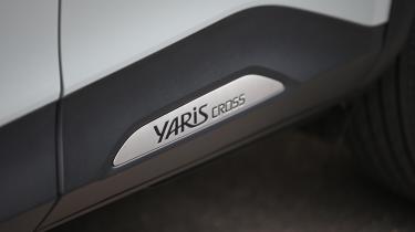 Toyota Yaris Cross - lower-door nameplate