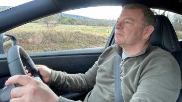 Steve Sutcliffe driving the Nissan Ariya Nismo