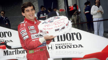 Ayrton Senna celebrates his 100th Formula 1 race at the 1990 Mexican Grand Prix