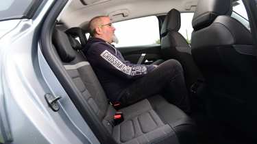 Auto Express senior road test editor sitting in the Citroen C4&#039;s back seat