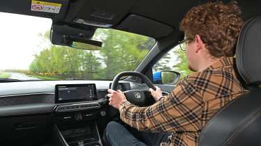 Auto Express content editor Ryan Birch driving the MG3