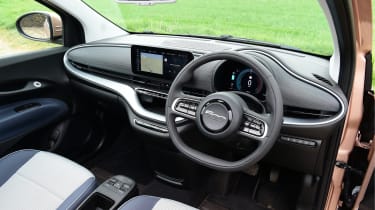 Toyota Aygo X vs Hyundai i10 vs Fiat 500 group test - Fiat 500 interior from driver&#039;s door